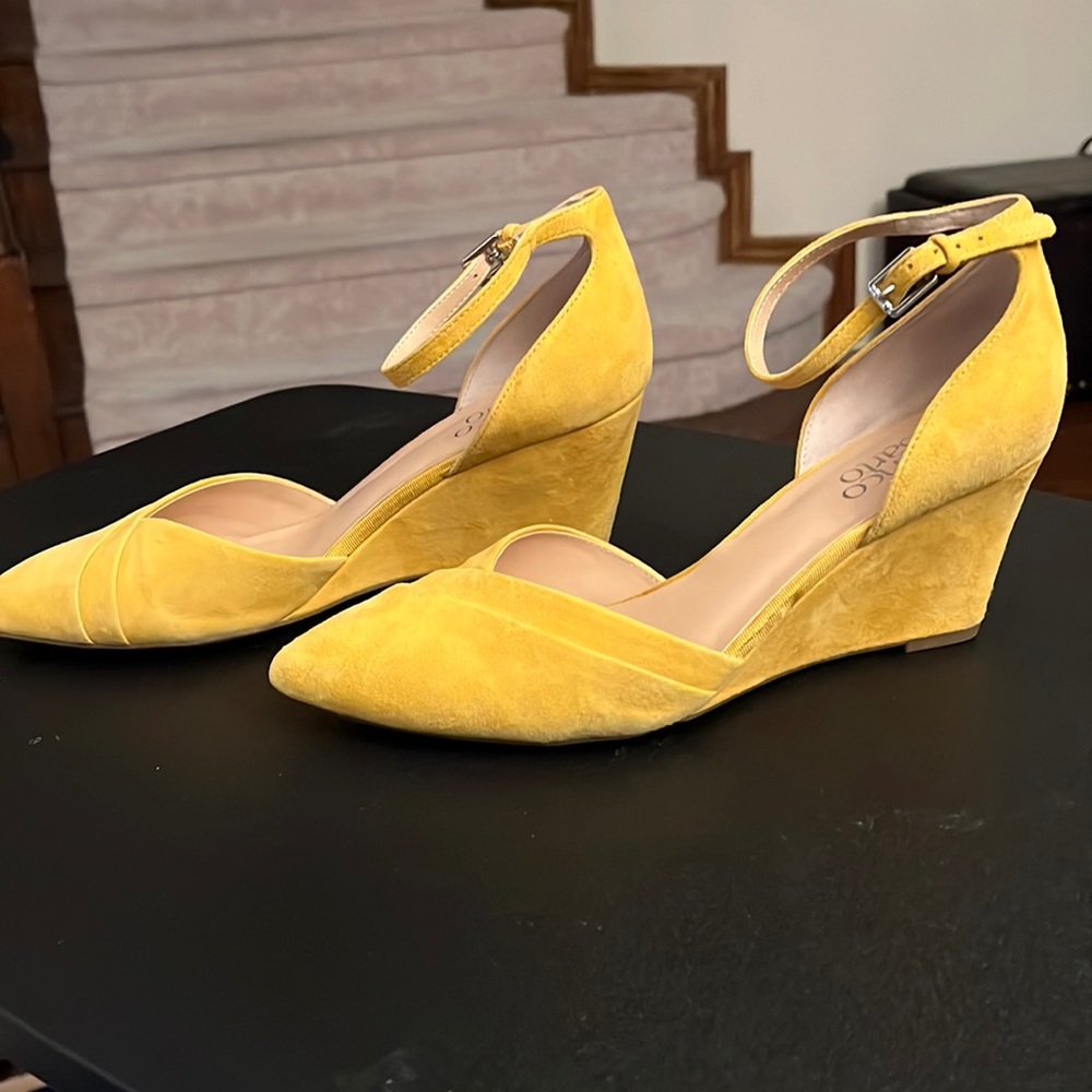 Yellow suede size 9 wedged heel shoes.